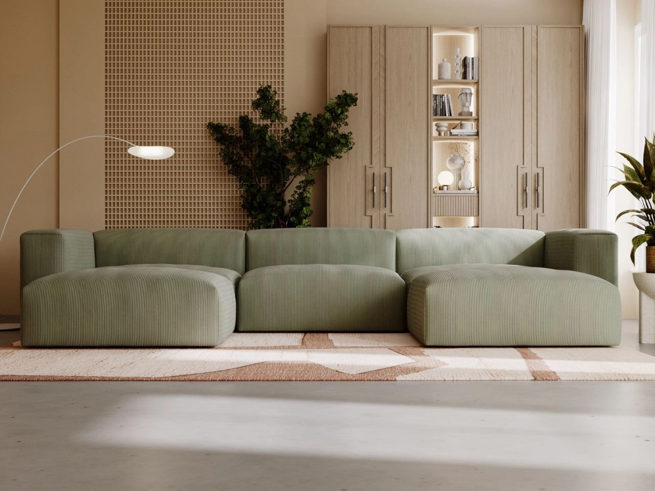 Modulares grünes Sofa in einem modernen, hellen Wohnzimmer